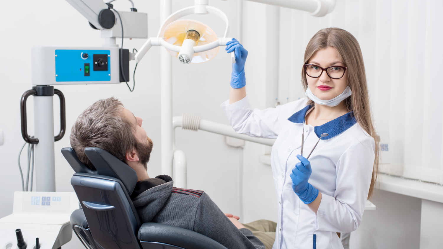 A modern Turkish dental clinic with a smiling dentist in a white coat