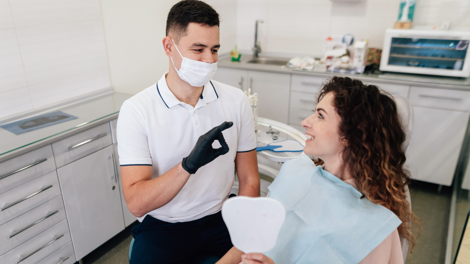 A photorealistic modern dental clinic in Turkey with a smiling female patient in a dentist’s chair