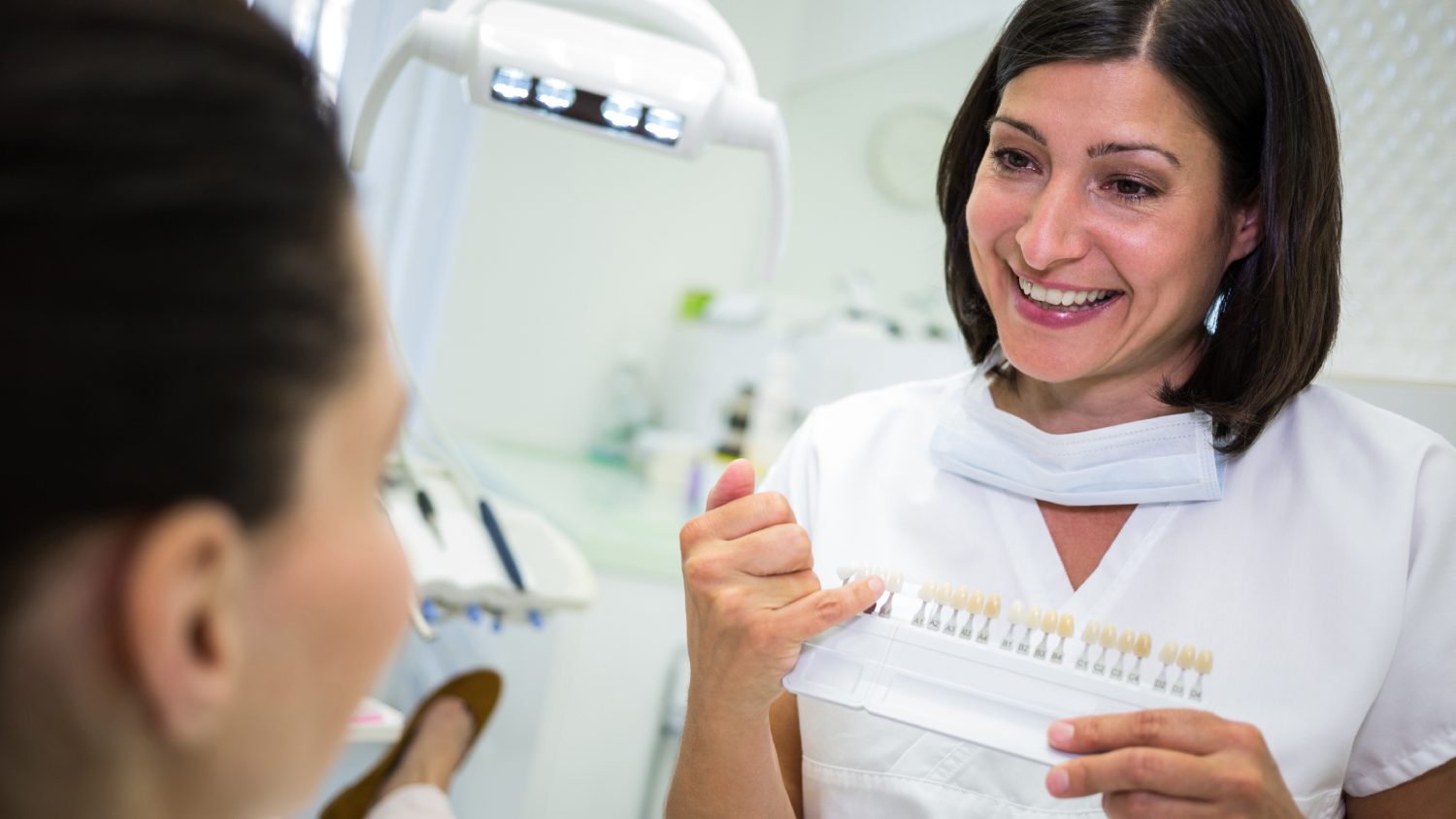 A modern Turkish dental clinic with a friendly dentist